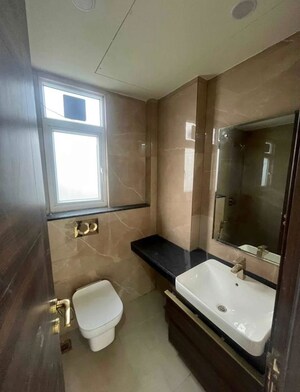Bathroom in 4 BHK Builder Floor at Ansal API Esencia, Sector 67 – for Sale