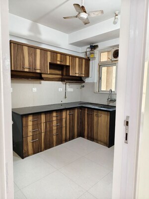 Kitchen in 2.5 BHK Apartment at Hiranandani Canary, Ghodbunder Road – for Sale