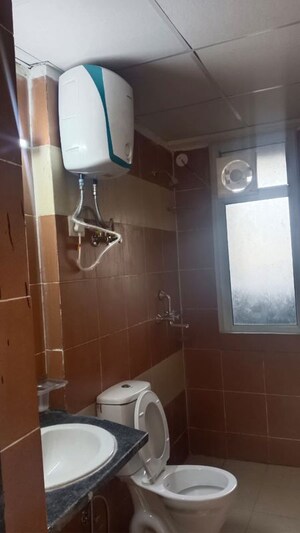 Bathroom in 2 BHK Apartment at Mahagun Mywoods, Sector 16c Greater Noida – for Rent