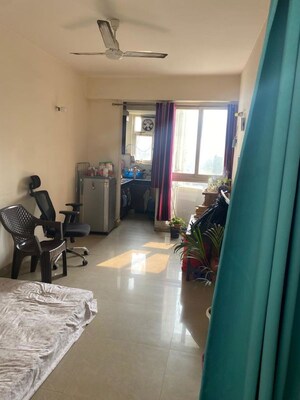 Living Room in 1 BHK Apartment at Aditya Celebrity Homes, Sector 76 – for Sale