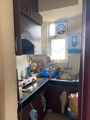 Kitchen in 1 BHK Apartment at Aditya Celebrity Homes, Sector 76 – for Sale