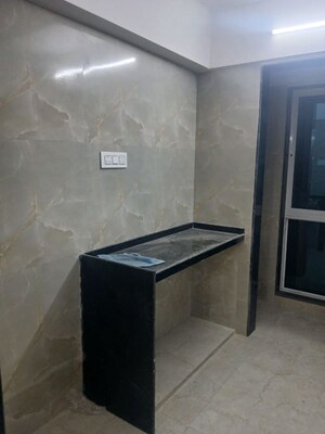 Kitchen in 3 BHK Apartment at Shreeji Atlantis, Malad West – for Rent