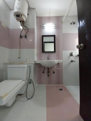 Bathroom in 3 BHK Apartment at Purvanchal Royal Park, Sector 137 – for Rent