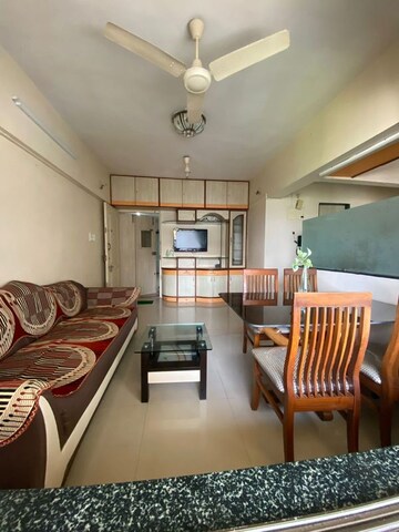 Living Room in 1 BHK Apartment at Ajmera Odyessey Apartment, Bhakti Park – for Rent