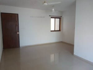 Living Room in 2 BHK Apartment at Rustomjee Elanza, Malad West – for Sale