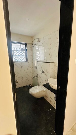 Bathroom in 3 BHK Apartment at Basil Mondale, Mundhwa – for Rent