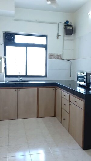 Kitchen in 2 BHK Apartment at Deep Apartment Andheri, Andheri West – for Rent