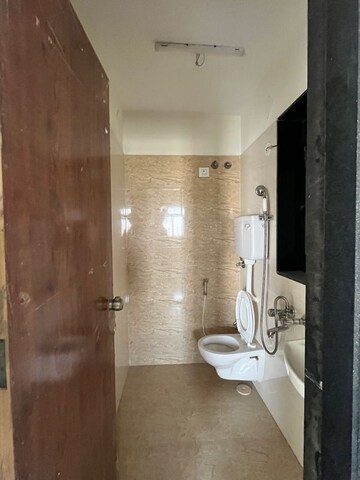 Bathroom in 1 BHK Apartment at Adityaraj Royale, Tagore Nagar – for Rent
