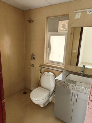 Bathroom in 3 BHK Builder Floor at Central Park Flower Valley Aqua Front Towers, Sohna Sector 33 – for Rent