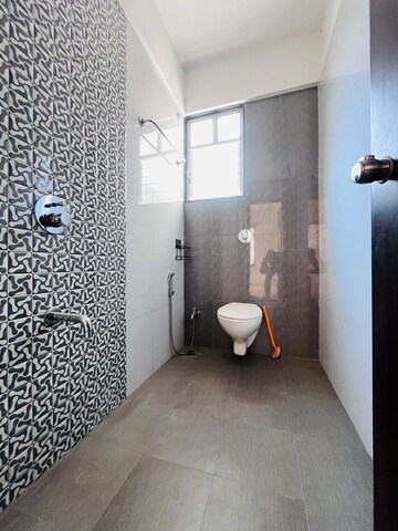 Bathroom in 2 BHK Apartment at Krishna Smruti Garden, Punawale – for Rent