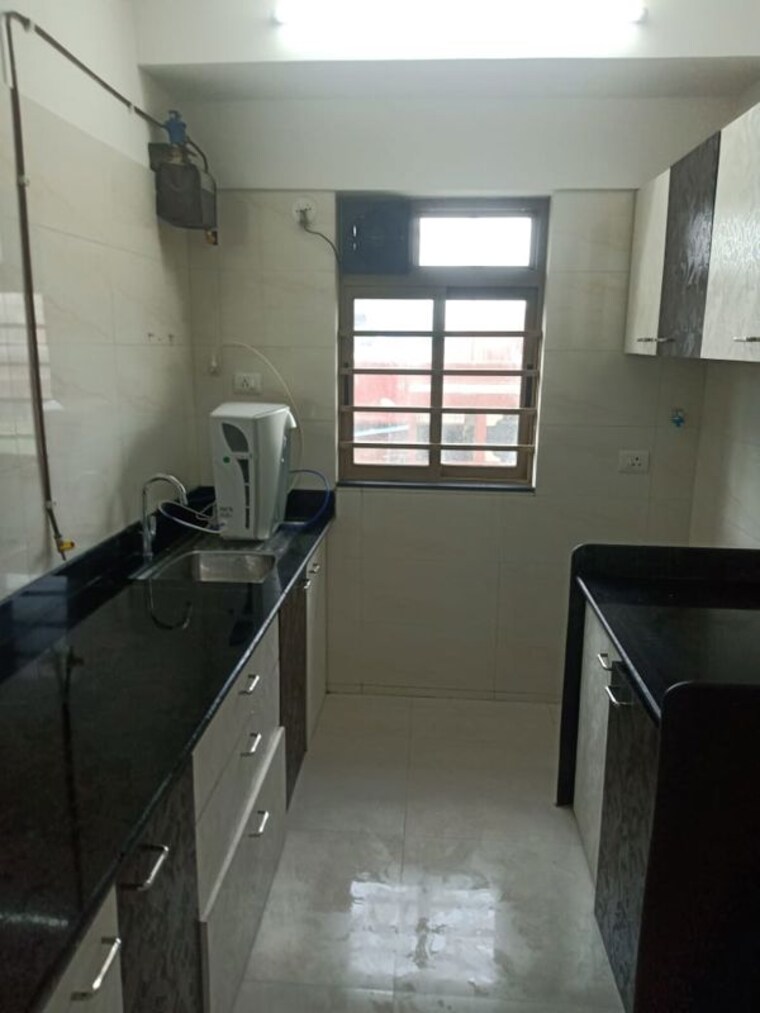 Kitchen, sheth-vasant-oasis 2 Bedroom 678 Sq.Ft. Apartment In Andheri East Mumbai 9774394