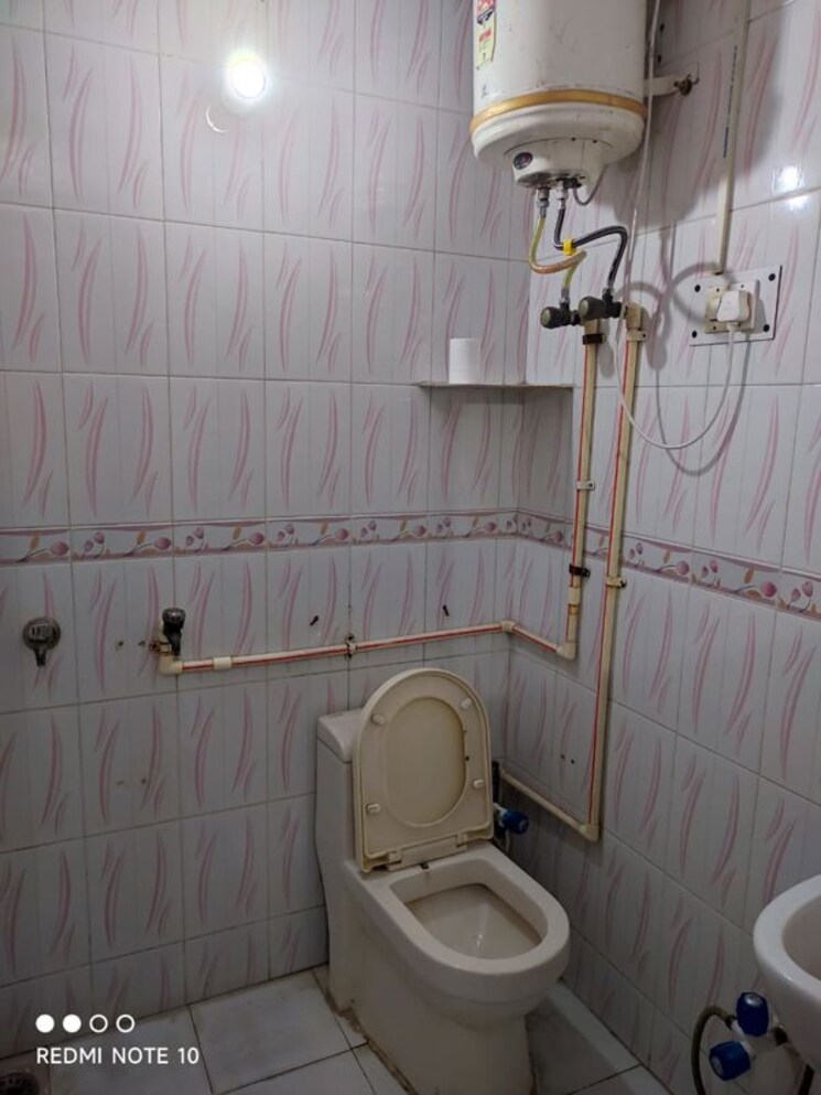 Bathroom, lord-mahavira-apartment 2 Bedroom 940 Sq.Ft. Apartment In Sector 29 Noida 9774463