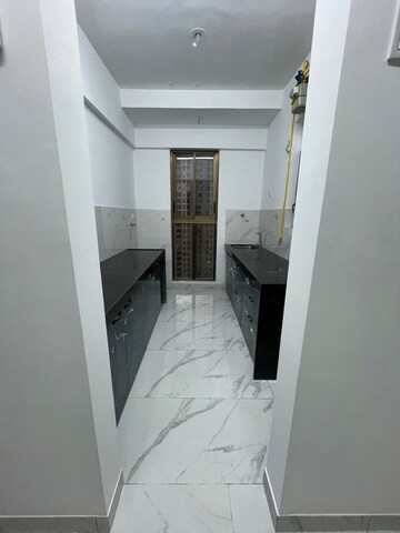 Kitchen in 2 BHK Apartment at Raymond Ten X Habitat, Pokhran Road No Two – for Rent