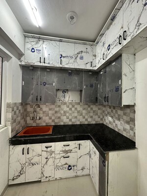 Kitchen in 2 BHK Apartment at Oasis GrandStand, Sector 22d Yamuna Expressway – for Rent