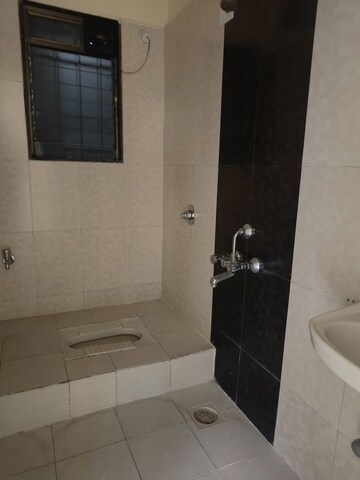 Bathroom in 2 BHK Apartment at Dosti Vihar, Samata Nagar – for Rent