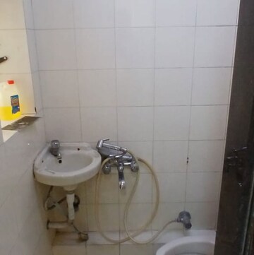 Bathroom in 2 BHK Apartment at Harmony CHS Andheri West, Lokhandwala Complex – for Rent