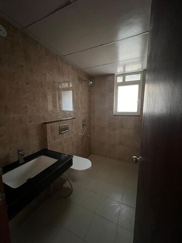 Bathroom in 4 BHK Apartment at Shapoorji Pallonji Joyville Gurgaon, Sector 102a – for Rent