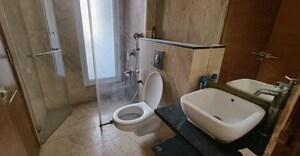 Bathroom in 3 BHK Apartment at Mahagun Mezzaria, Sector 78 – for Rent