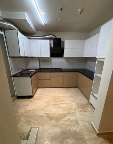 Kitchen in 3 BHK Apartment at Mahagun Mezzaria, Sector 78 – for Rent