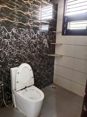Bathroom in 4 BHK Builder Floor at Sector 18 – for Rent
