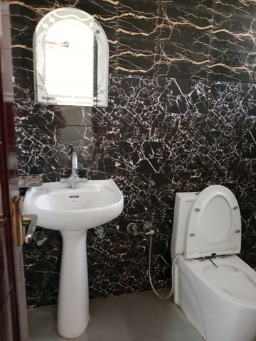 Bathroom in 4 BHK Builder Floor at Sector 18 – for Rent