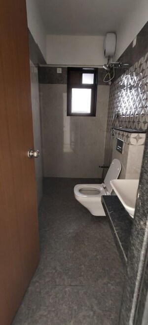 Bathroom in 3 BHK Apartment at Naman Habitat, Andheri West – for Sale
