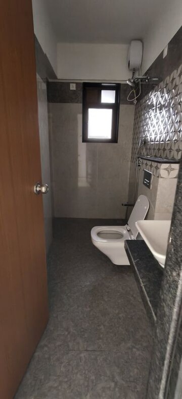 Bathroom in 3 BHK Apartment at Naman Habitat, Andheri West – for Sale