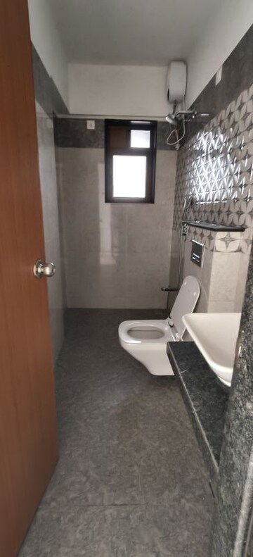Bathroom in 3 BHK Apartment at Naman Habitat, Andheri West – for Sale