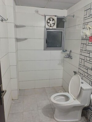 Bathroom in 3 BHK Apartment at Sector 16 Greater Noida – for Rent