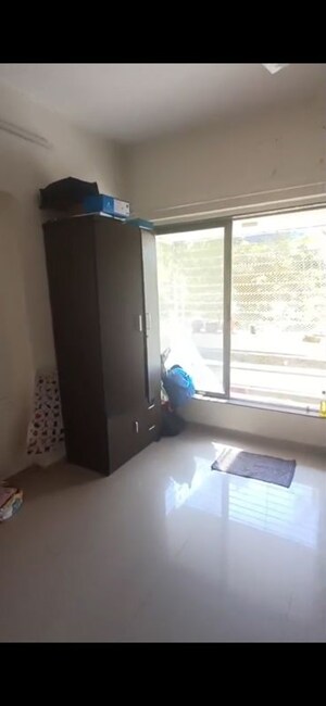 Bedroom in 2 BHK Apartment at Evershine Grandeur, Malad West – for Rent