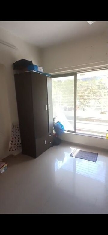 Bedroom in 2 BHK Apartment at Evershine Grandeur, Malad West – for Rent