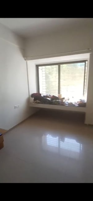 Bedroom in 2 BHK Apartment at Evershine Grandeur, Malad West – for Rent