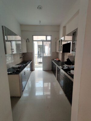 Kitchen in 4 BHK Apartment at Sector 16 Greater Noida – for Rent