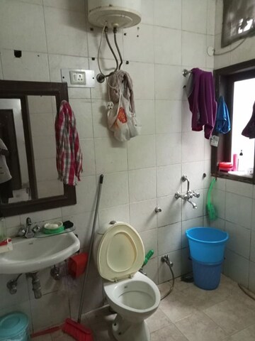 Bathroom in 2 BHK Apartment at Vasant Vihar – for Sale