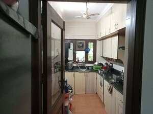 Kitchen in 2 BHK Apartment at Vasant Vihar – for Sale