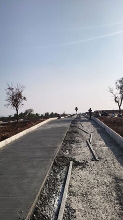 Plot For Sale in NRI Anmol Urban Towns