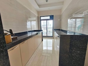 Kitchen in 3 BHK Apartment at Je And Vee Om Trimurti, Malad East – for Sale