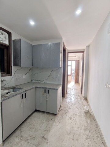 Kitchen in 1 BHK Apartment at Chattarpur – for Sale