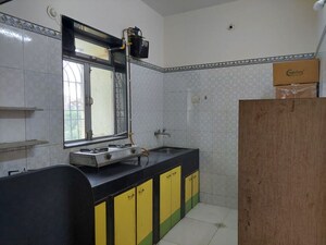 Kitchen in 2 BHK Apartment at Haware Silicon Tower, Palm Beach – for Sale