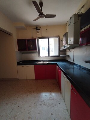 Kitchen in 2 BHK Apartment at Swastik Regalia, Waghbil – for Rent