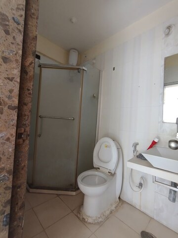 Bathroom in 2 BHK Apartment at Swastik Regalia, Waghbil – for Rent