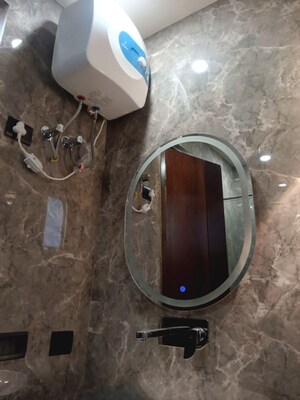 Bathroom in 3 BHK Builder Floor at Rajouri Garden – for Sale