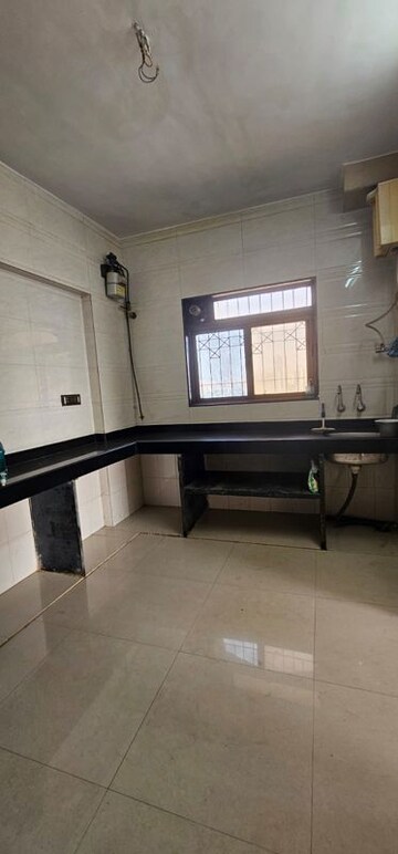 Kitchen in 1 BHK Apartment at Asmita Jyoti CHS, Malad West – for Rent