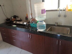 Kitchen in 2 BHK Apartment at Tanishq Apartment, Kharadi – for Rent