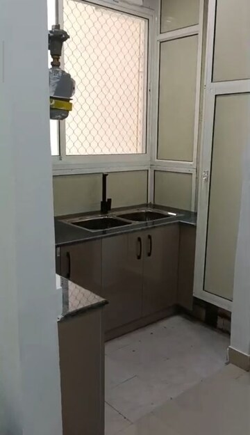Kitchen in 3 BHK Apartment at Sanchar Nest Palm Valley, Wave City – for Rent
