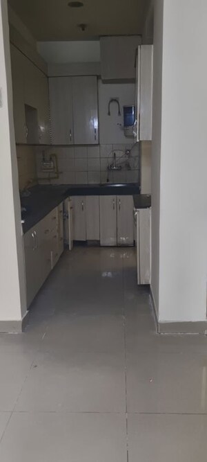 Kitchen in 3 BHK Apartment at Ajnara Grace, Raj Nagar Extension – for Rent