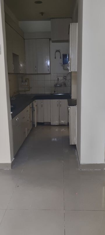Kitchen in 3 BHK Apartment at Ajnara Grace, Raj Nagar Extension – for Rent