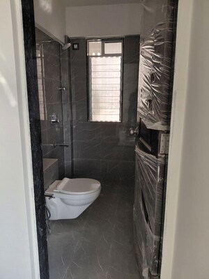 Bathroom in 2 BHK Apartment at Happy Home Nehaj Apartment, Goregaon West – for Rent
