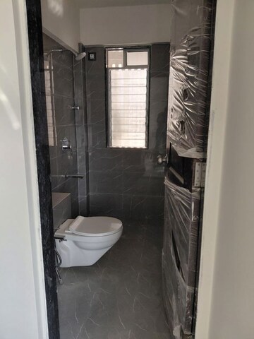 Bathroom in 2 BHK Apartment at Happy Home Nehaj Apartment, Goregaon West – for Rent