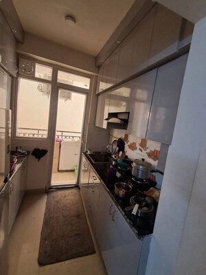 Kitchen in 3 BHK Apartment at AIG Park Avenue, Sector 4 Greater Noida – for Rent